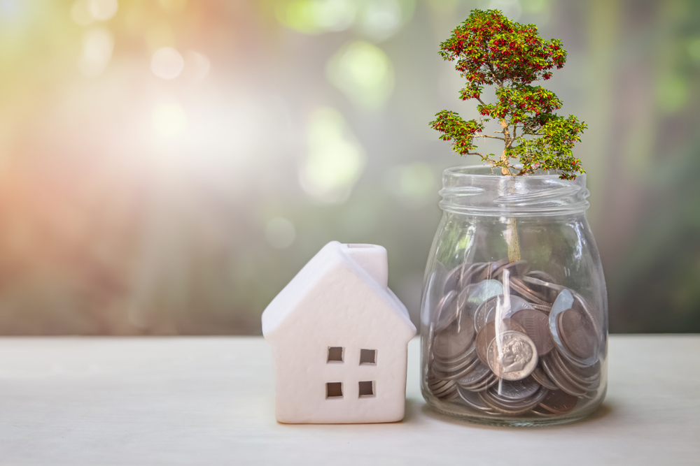 Geld, das für ein energieeffizientes Haus gespart wurde.