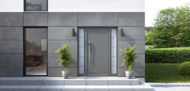 Eine dunkelgraue Alu-Haustür eines energieeffizienten Hauses